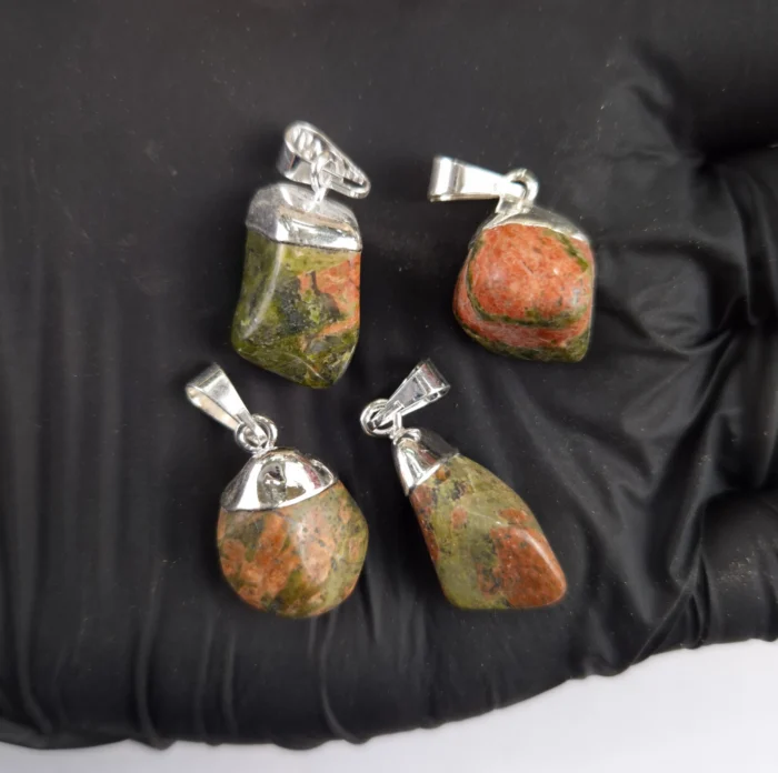 DRCE105-1.webp Dije rolado c/e Unakita - Imagen 1