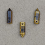 Pico facetado y perforado de Ojo de tigre