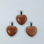 Dije corazón de Piedra del sol Sintética