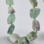 Pieza de piedra perforada en bruto de Fluorita - Imagen 2