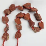 Pieza de piedra perforada en bruto de Jaspe Rojo - Imagen 3