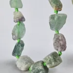 Pieza de piedra perforada en bruto de Fluorita - Imagen 2