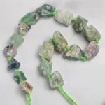 Pieza de piedra perforada en bruto de Fluorita
