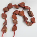 Pieza de piedra perforada en bruto de Jaspe Rojo - Imagen 3