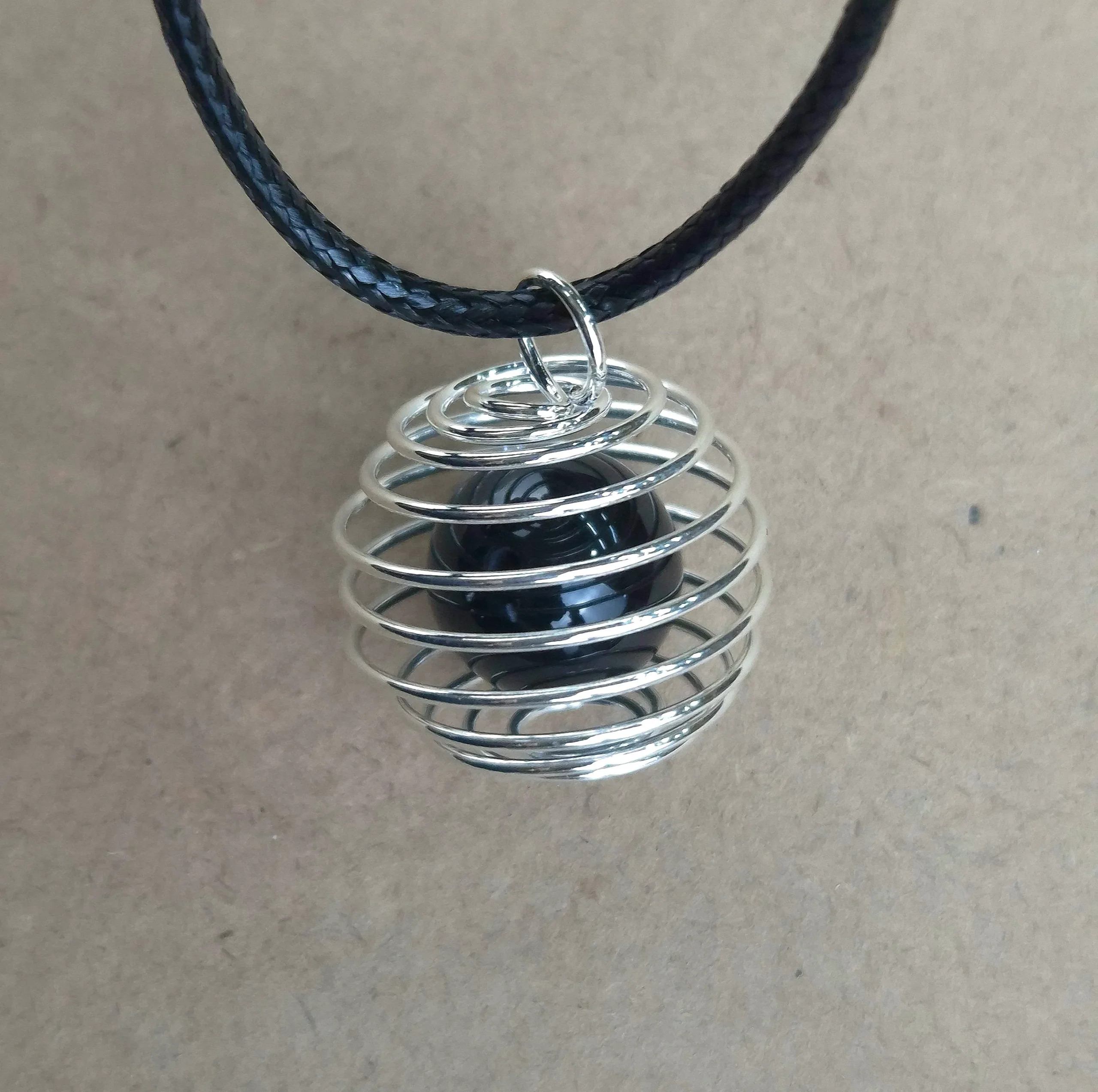 DJCP77-1.webp Dije Jaula con piedra con cordon de Obsidiana negra - Imagen 1